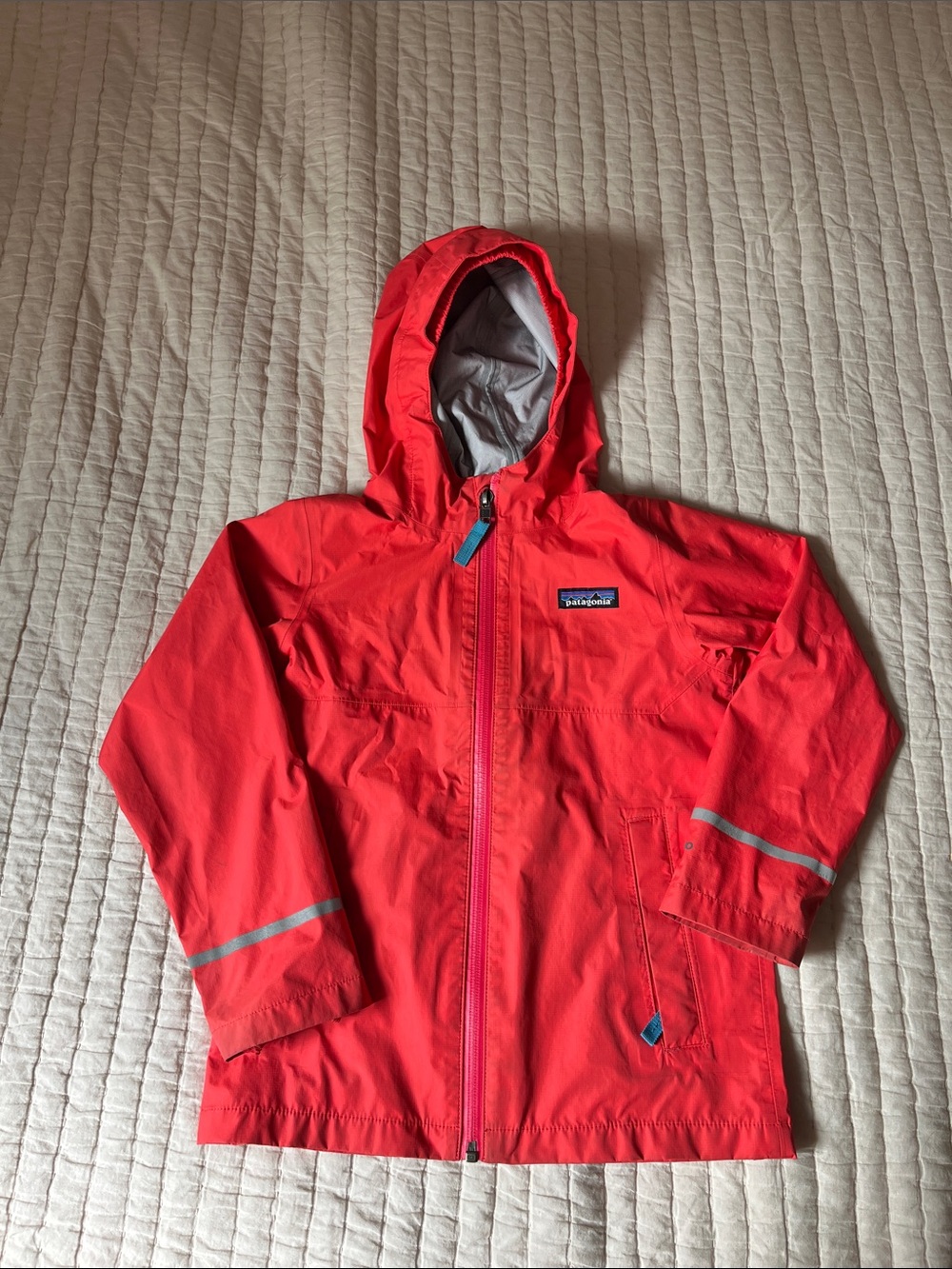 Patagonia Kids Coral-Red Hooded Raincoat with Reflective Trim